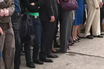 穿顧客的鞋行走市場